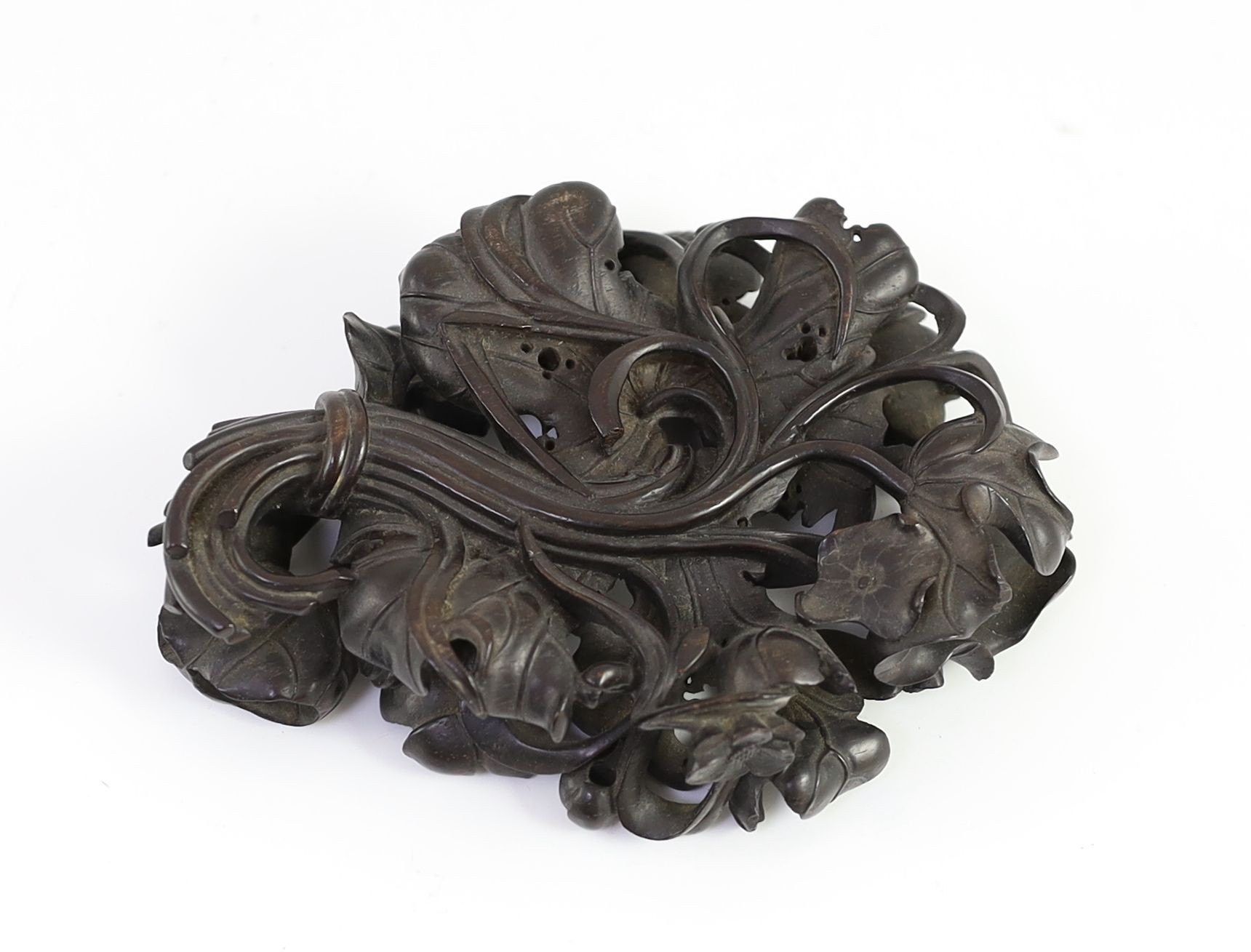 A fine Chinese carved zitan ‘lotus’ stand, Qing dynasty, 14.5cm long, small losses